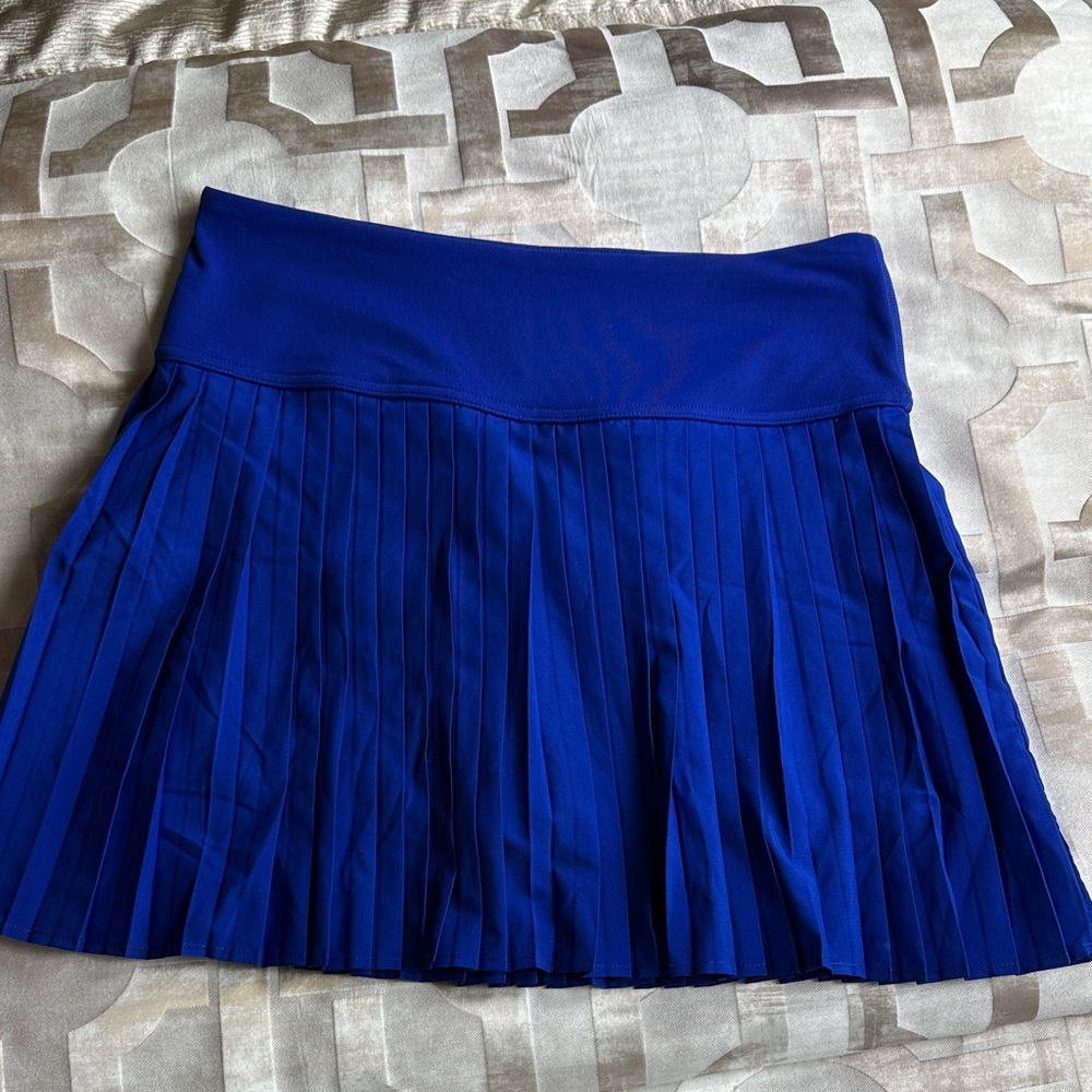 Fabletics Vibrant Blue Pleated Sports Skirt with inbuilt shorts.
